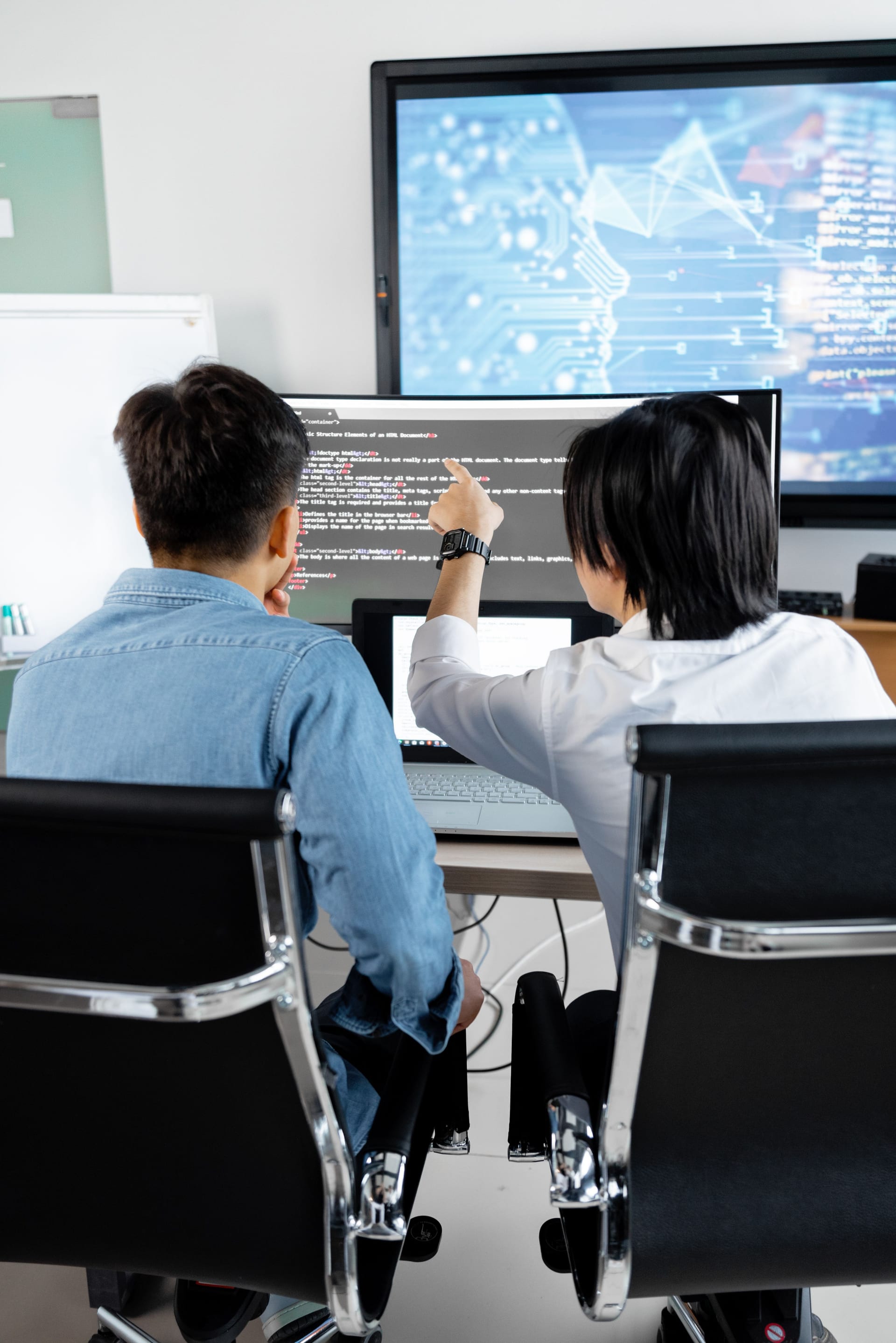 Developer working at a code editor for a website project